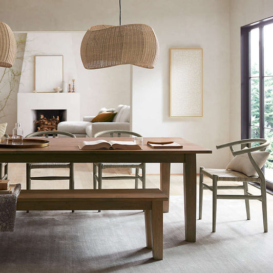 Althea Wicker Rattan Pendant Lamp hanging over dining table