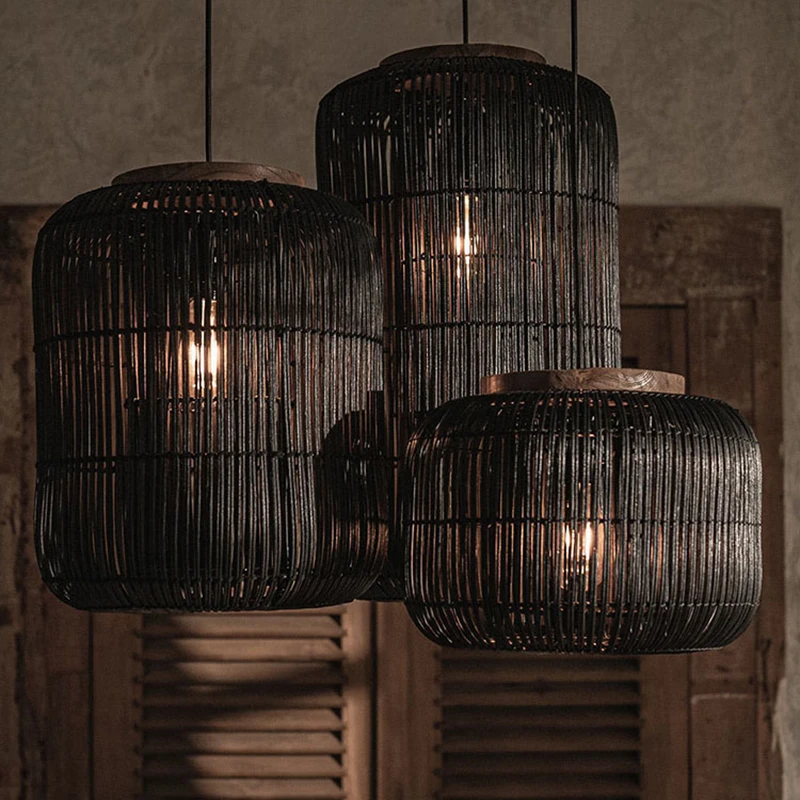dBodhi black rattan barrel hanging pendant lamps with a cylindrical shape