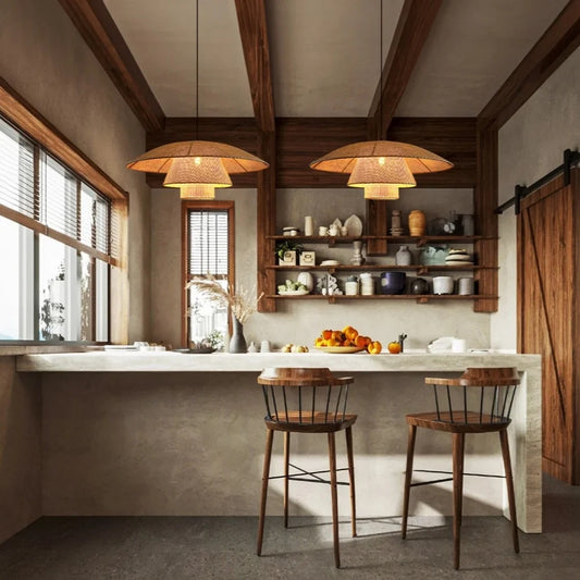 lola extra large rattan wicker pendant light hanging over kitchen island