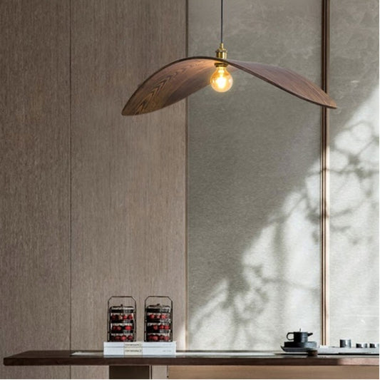 wabi sabi wood flying bird curved hanging lamp in meditation area