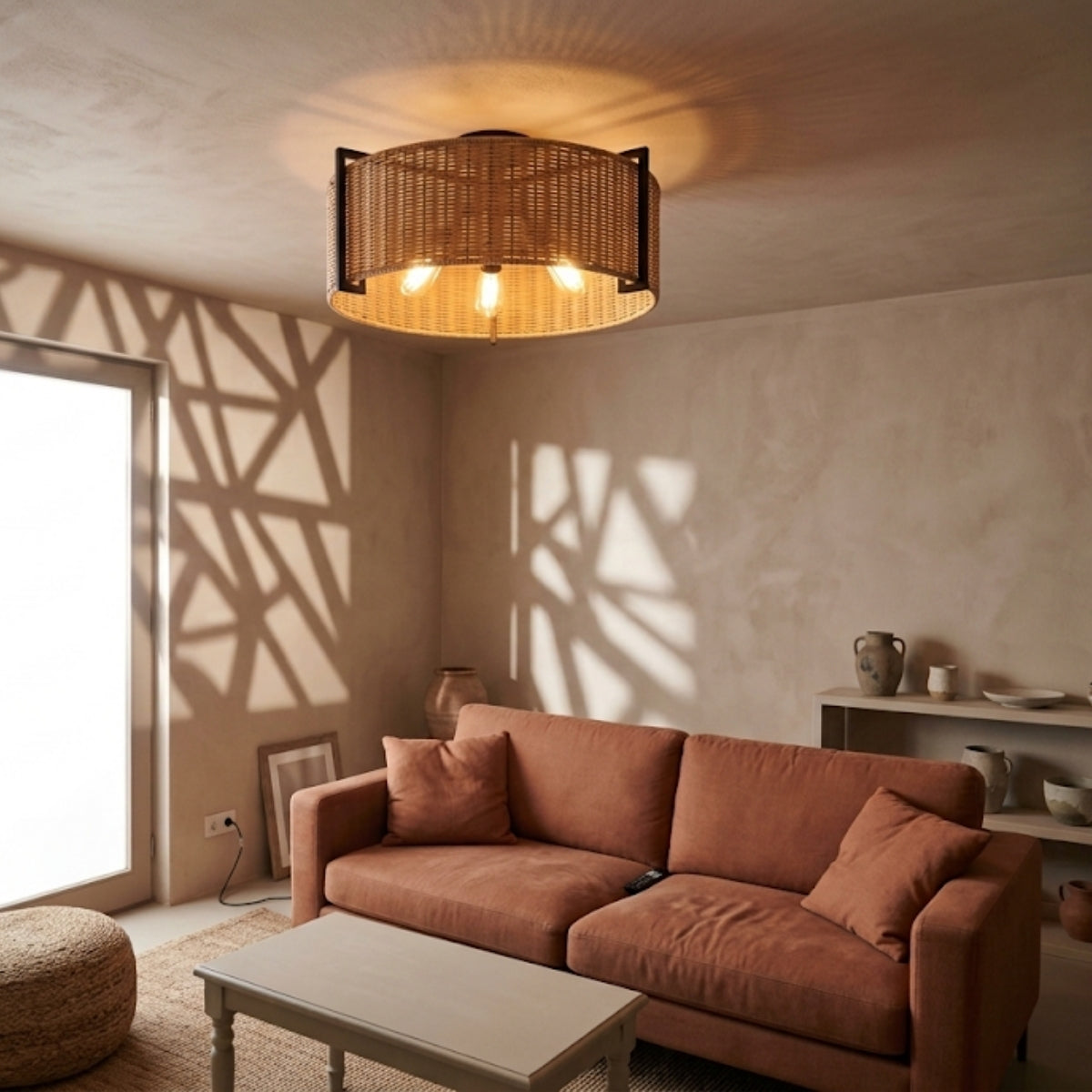 Grove Rattan Drum Flush Mount in living room, wide woven drum face reading at a distance as a ceiling centerpiece above the sofa line