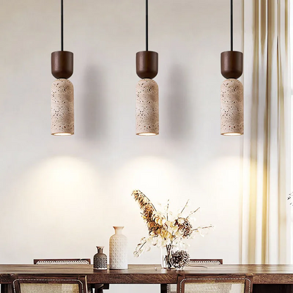 3 Auren Wabi Sabi Cylinder Stone and Wood Pendant Lights over dining table