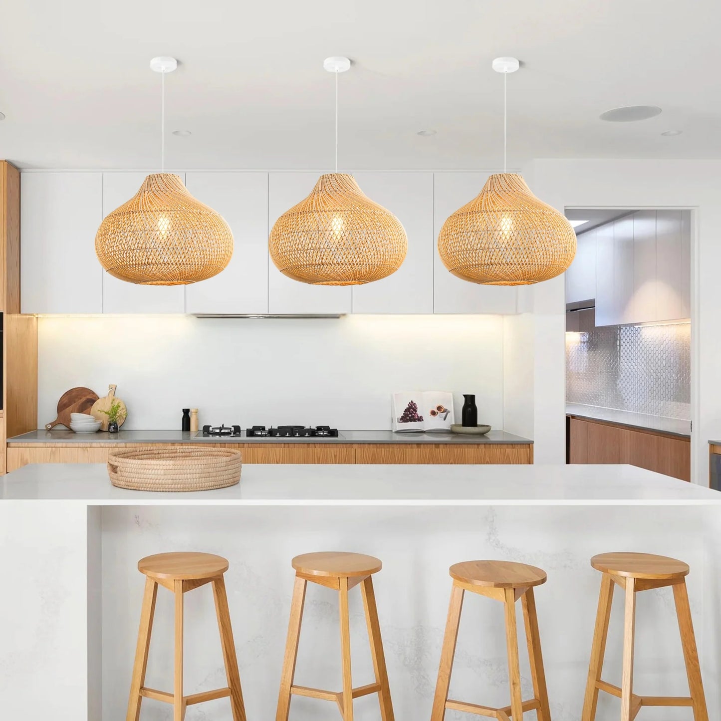 3 Karjear Rattan Pendant Lights over Boho Kitchen Island