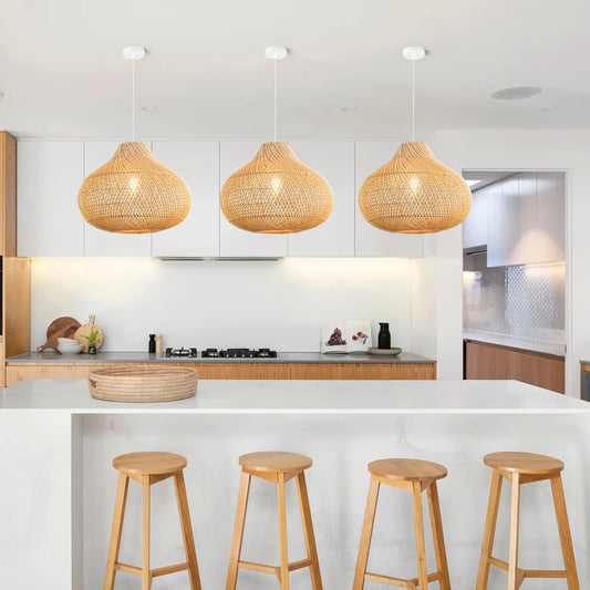 3 Karjear Rattan Pendant Lights over Boho Kitchen Island