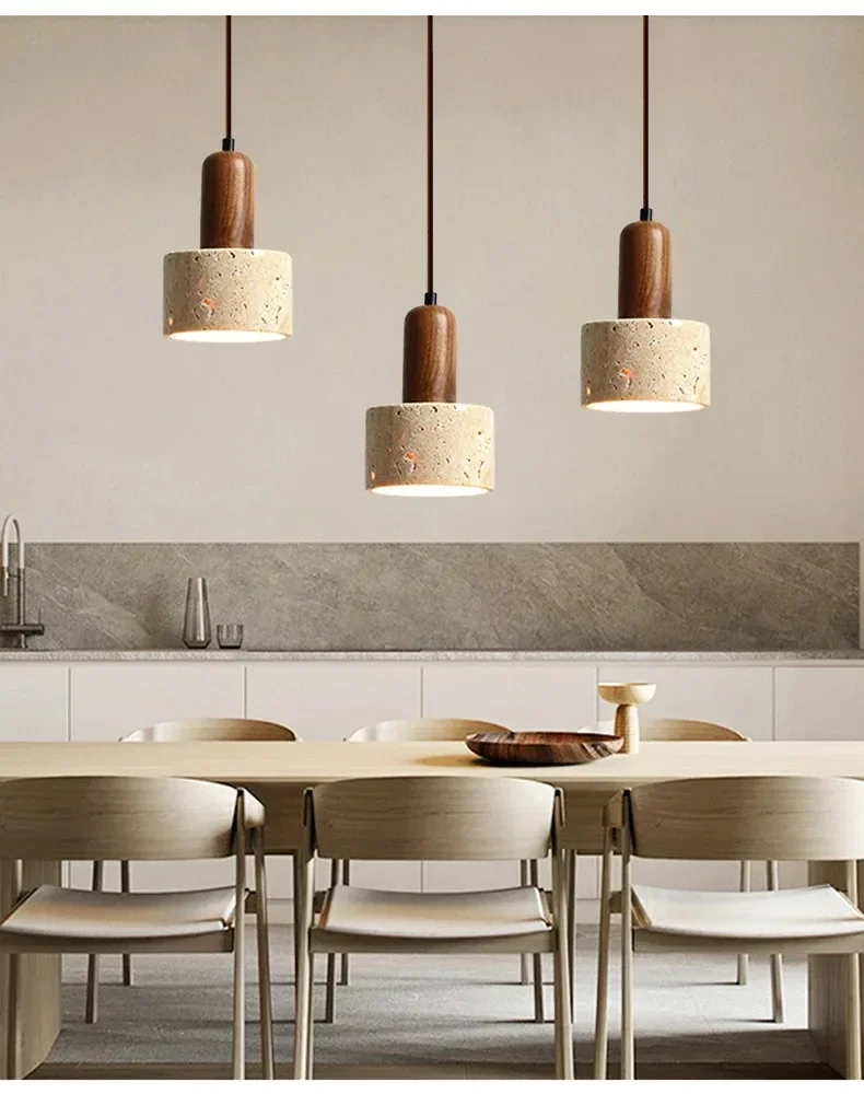 3 Ora Cylinder Travertine Stone Pendant Lights over Wabi Sabi Dining Table