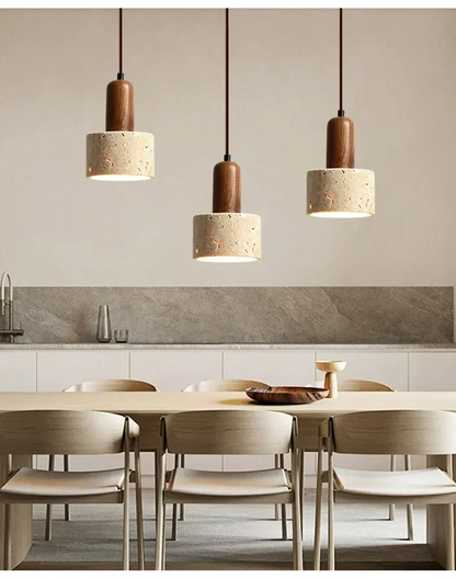 3 Ora Cylinder Travertine Stone Pendant Lights over Wabi Sabi Dining Table