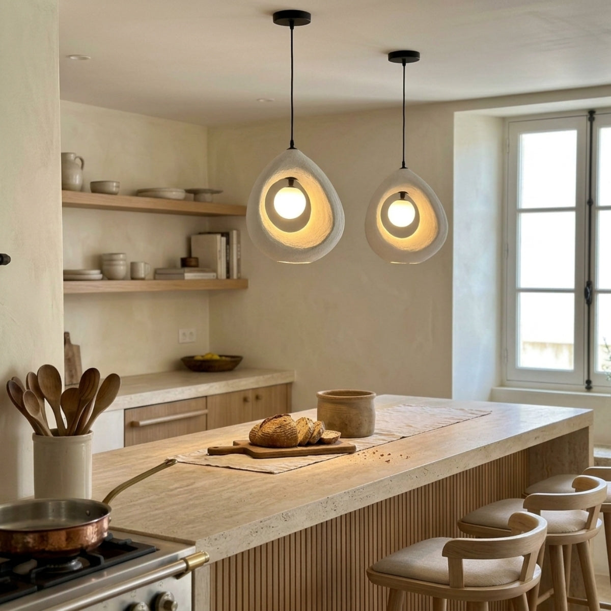 Cave Surround Wabi Sabi Pendant Light over kitchen island, clustered white ribbed teardrop shades casting focused warm task light across a honed marble prep counter