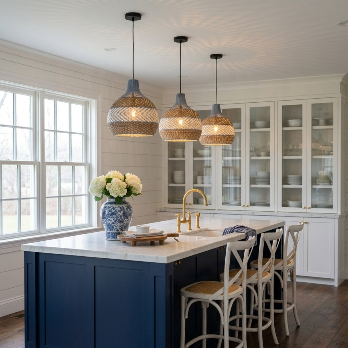 Courtland Blue Rattan Pendant Light over kitchen island, clustered tri-color wicker domes spaced evenly to cast warm filtered task light across a butcher block counter