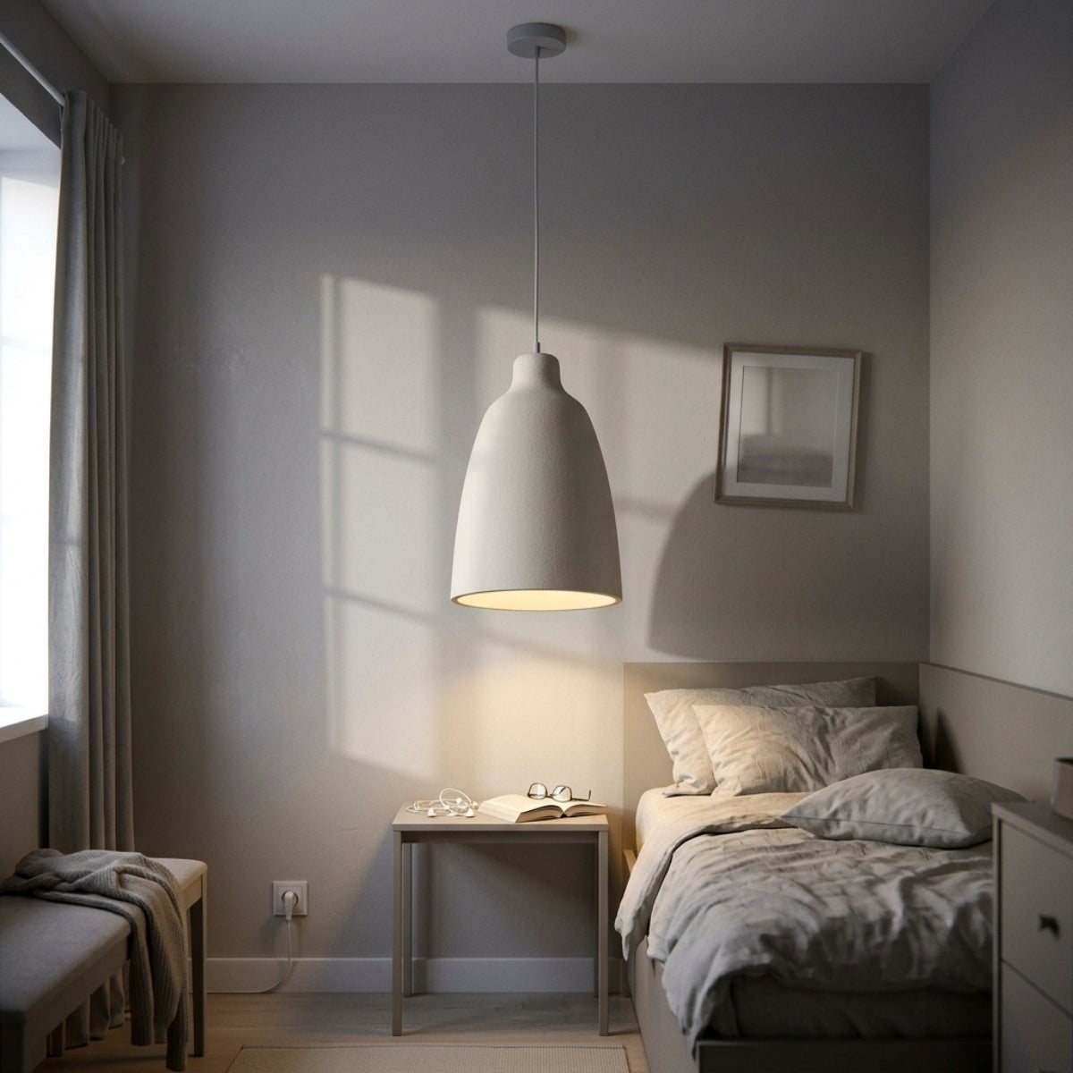 Ebony Wabi Sabi Cylinder Pendant Light in bedroom, mid-width tapered cylinder beside the bed replacing a table lamp without crowding the nightstand surface