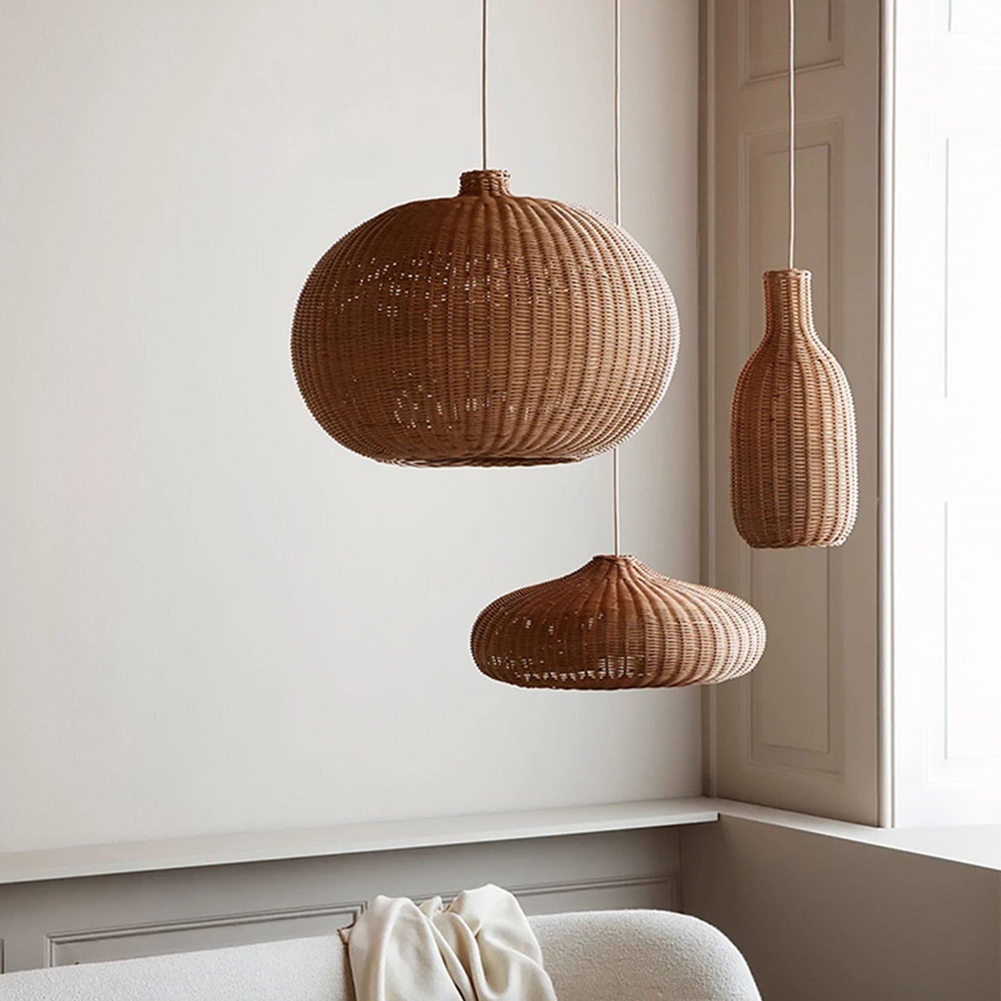 finns-3-light-rattan-pendants-in-the-bedroom