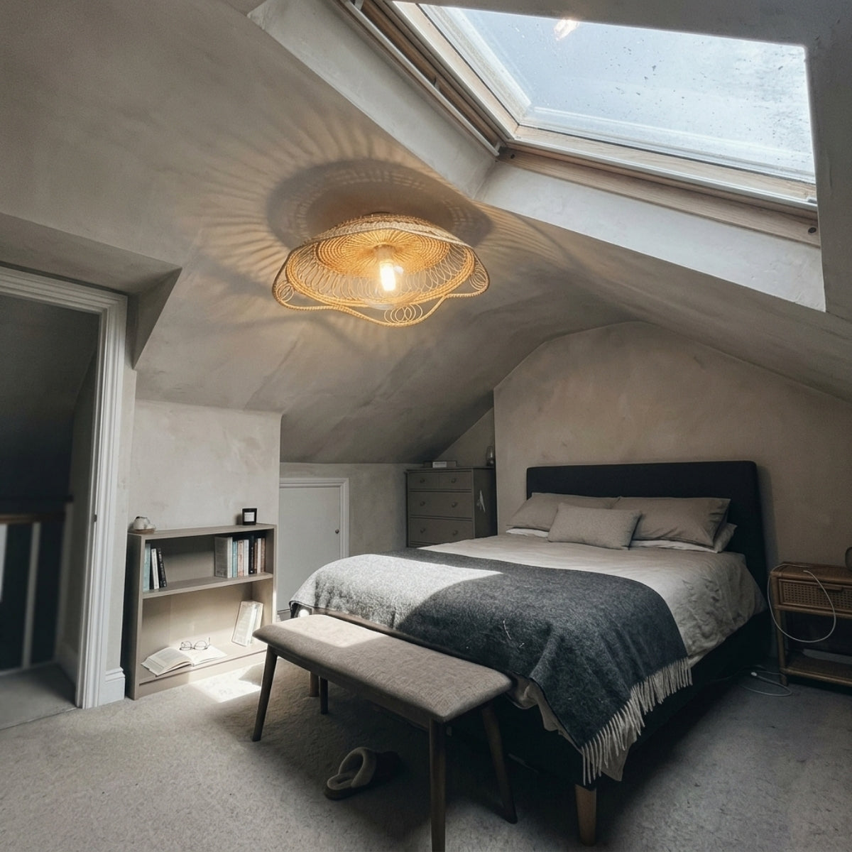 Havana Rattan Ceiling Light in bedroom, flower dome beside the nightstand, open spiral weave softening light for late reading without glare in the eyes