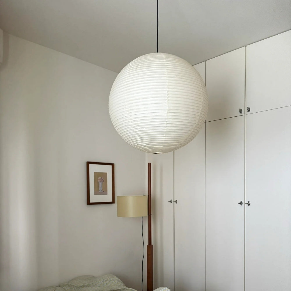 Japanese Wabi Sabi Rice Paper Ball Pendant Light in bedroom, 15.7-inch globe dropped beside the bed standing in for a table lamp with softened reading light