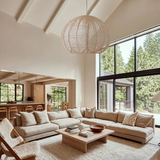 Klahn Rattan Pendant Light hanging in living room