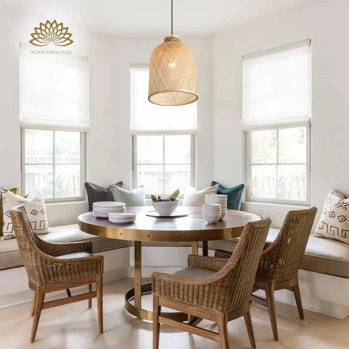 Lampada Natural Bamboo Pendant in dining room, tall bell shade centers above the tabletop, its open lattice casting even coverage without glare