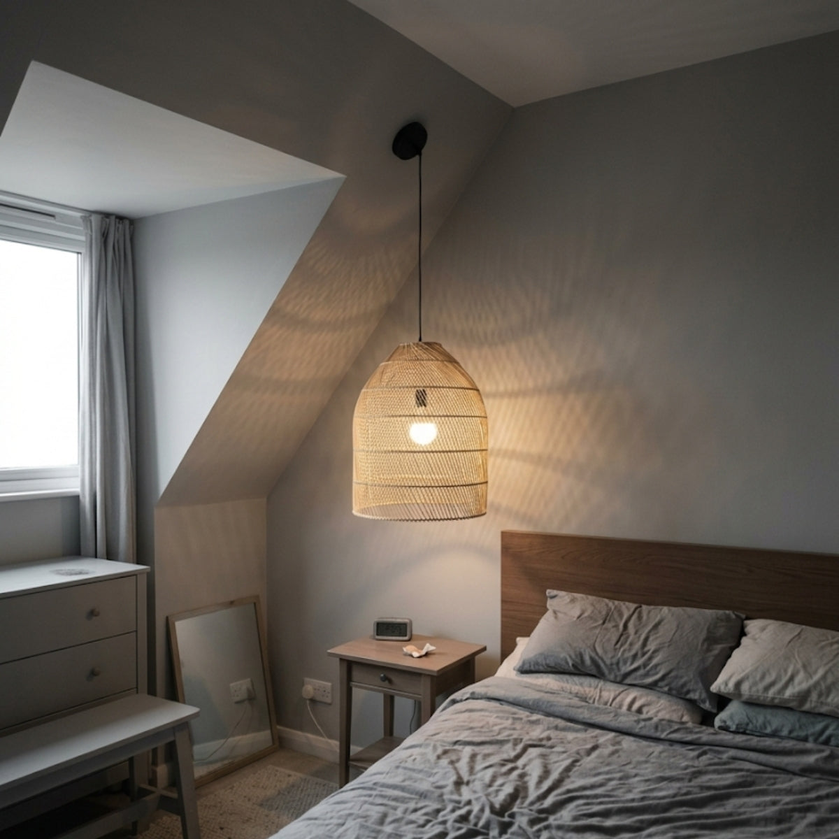Maya Bamboo Rattan Pendant in bedroom, compact diamond lattice dome sized for bedside use with the shade sitting at eye level
