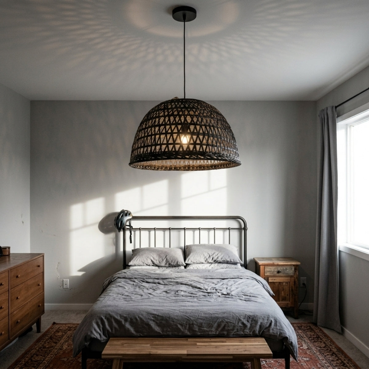 Neroweave Extra Large Black Dome Rattan Pendant beside the bed, medium dome freeing nightstand space while open weave softens light for reading