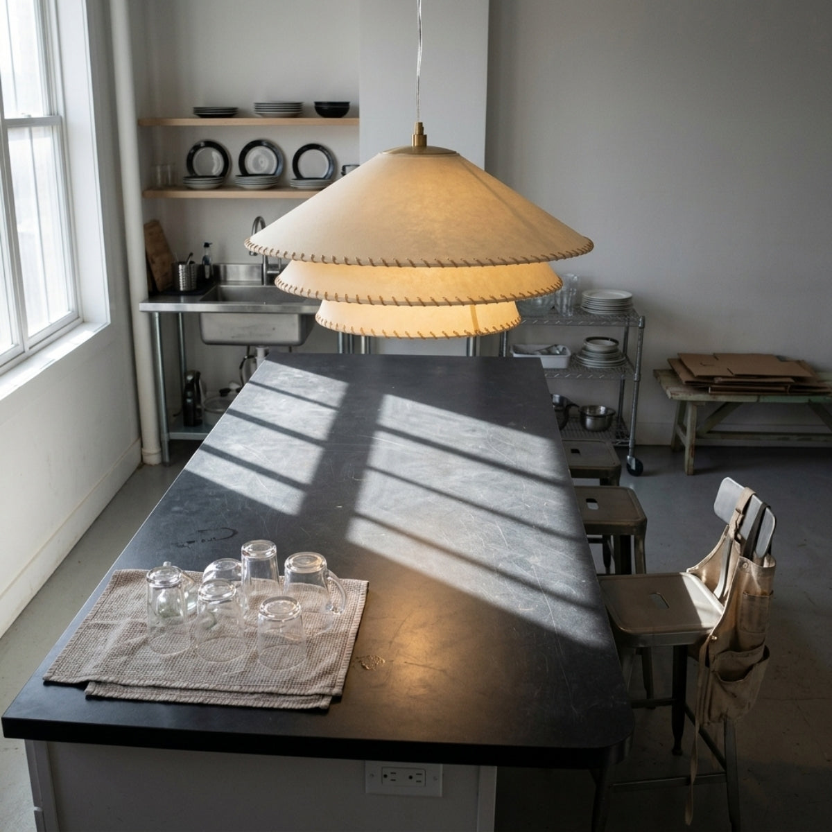 Planas Wabi Sabi Tiered Pendant Light over kitchen island, clustered small 15.7-inch tiered shades spaced evenly for consistent task light across the counter