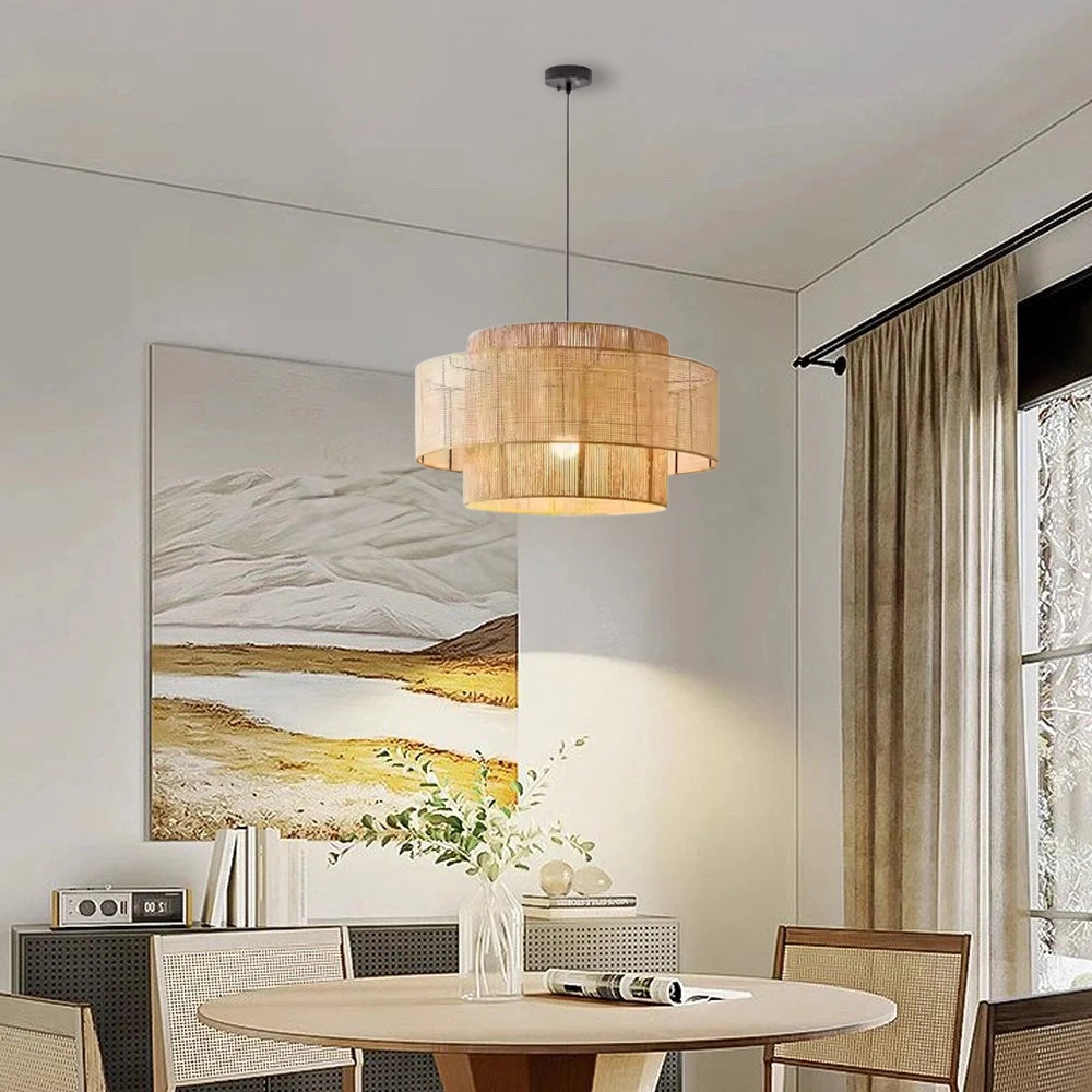 Triela Rattan Pendant Lamp hanging above dining table