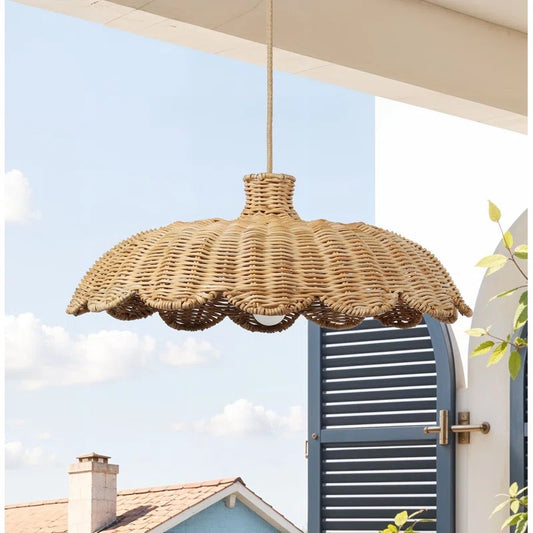 Alice Scallop Rattan Wicker Pendant Light hangs on the balcony