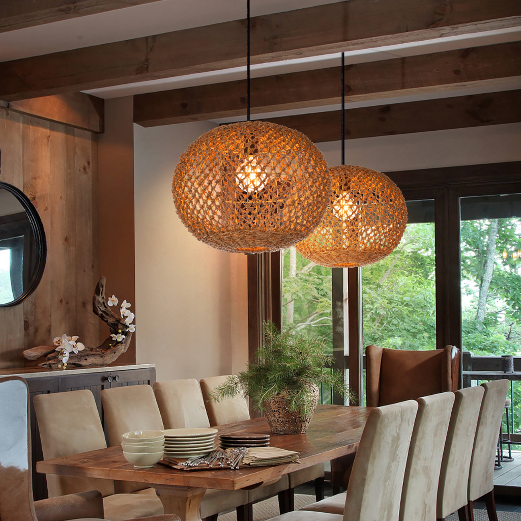 Antigua Flat Round Wicker Pendant Lights above rustic Dining Table