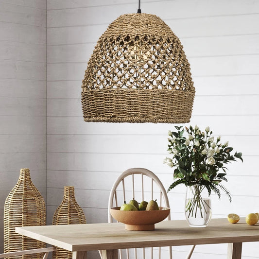 Artibrannan Basket Rattan Woven Pendant Light hangs over a Wooden Dining Table
