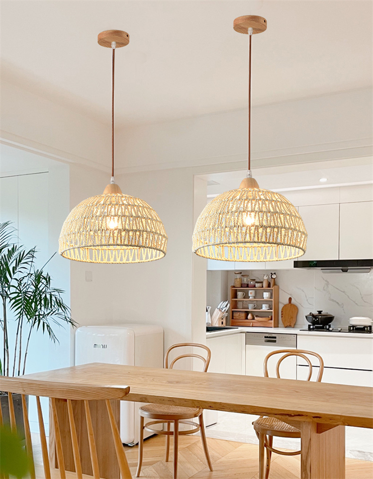 Campana Small White Rattan Basket Pendant Lights hang over a minimalist Kitchen Island