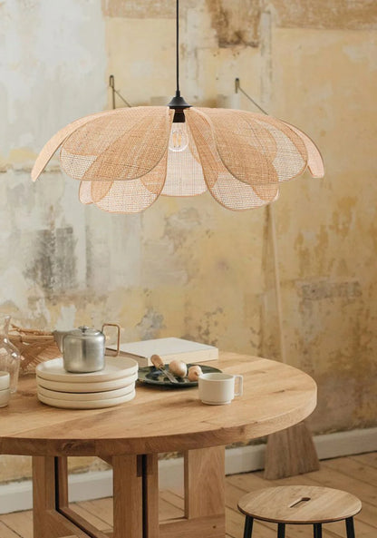Cefalu rattan petal ceiling light over Wooden Coffee Table