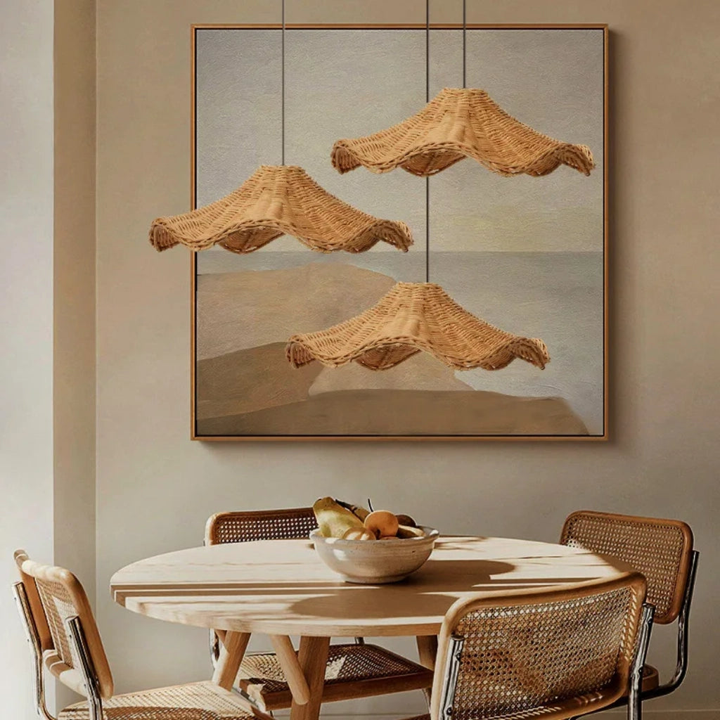 Cluster of Three Ariel Wave Rattan Pendant Lights for Wabi Sabi Dining Room