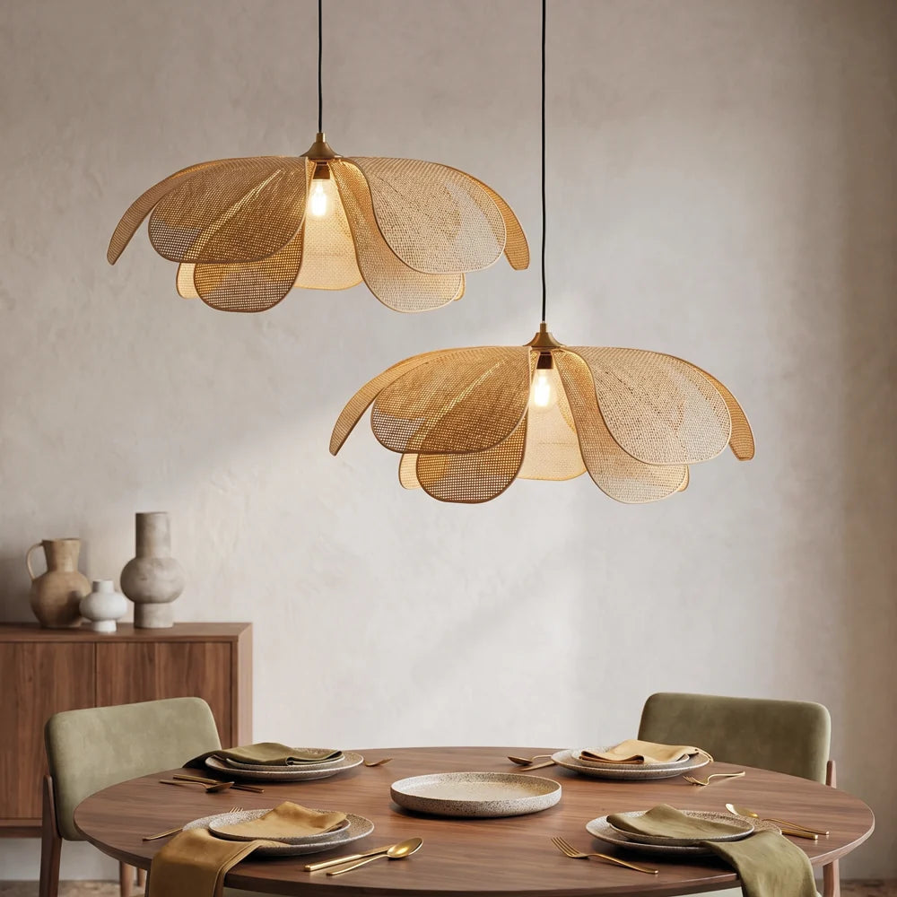 Double Cefalu rattan flower pendant lights hang over Wabi Sabi Round Dining Table