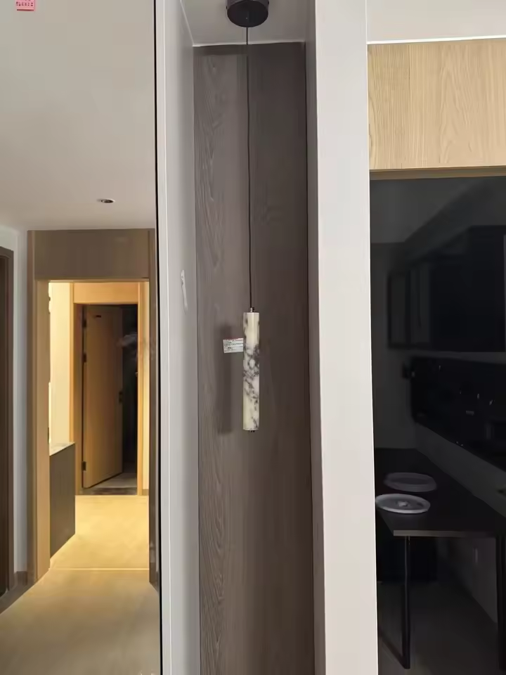 Rayvia Cylinder Alabaster Marble Pendant Light - Lifestyle & Artisan Detail Angle 14 | IndochinaLight