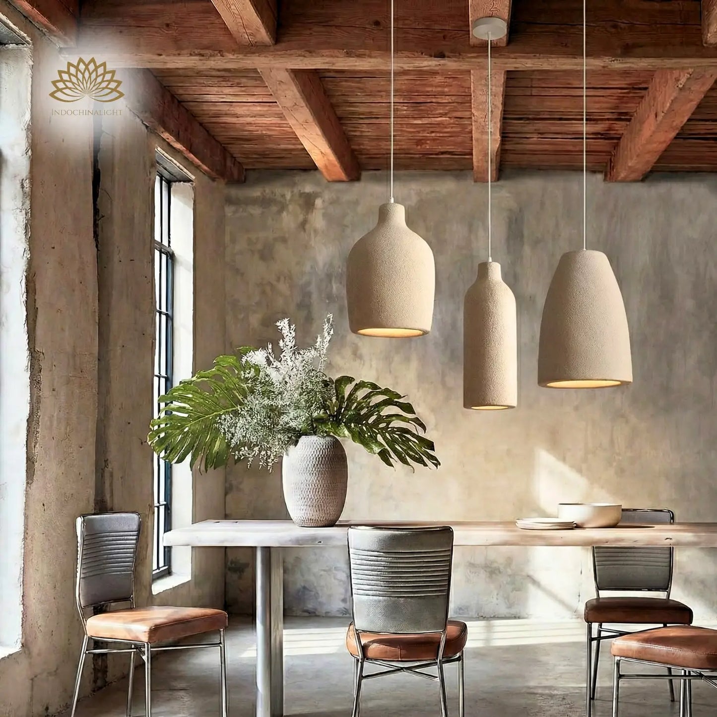 Ebony Wabi Sabi Vase Concrete Pendant Light hanging over dining table