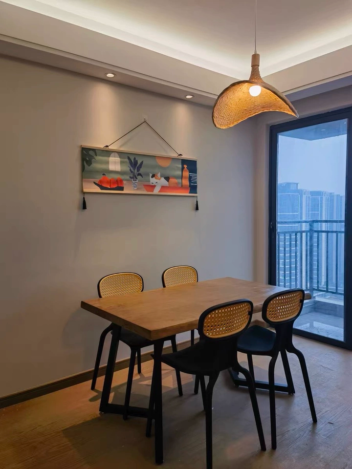 Ellie Hat 3 Rattan Pendant Light hangs over IndochinaLights Customer Small Dining Table