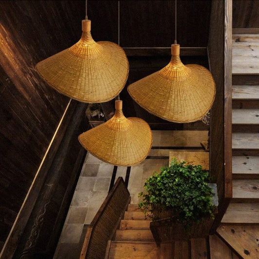 Ellie Hat Cluster of 3 Bamboo Wicker Pendant Lights hang over Stairway