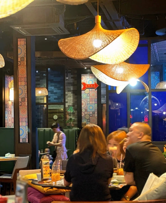 Ellie Hat Rattan 3 Light Pendant over IndochinaLights Customer Cafe Tables