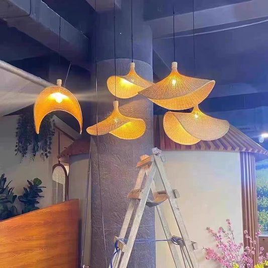 Ellie Hat Rattan 3 Light Pendants after Installation in IndochinaLights Customer Restaurant