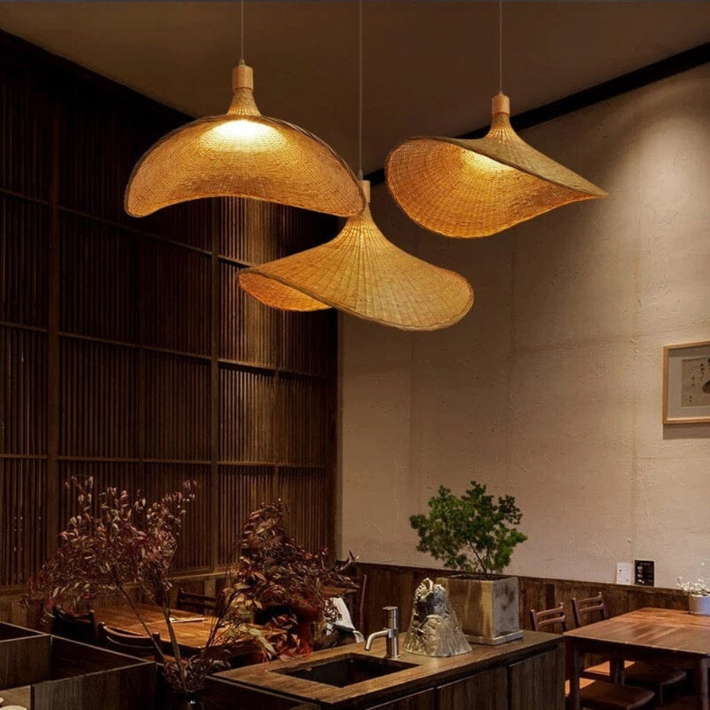 Ellie Straw Hat 3 Light Rattan Pendants hang over Zen-style Kitchen Island