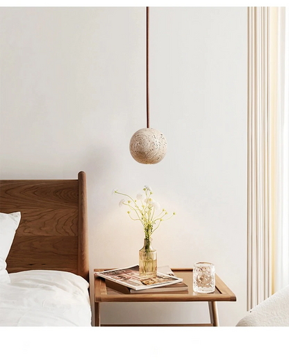 Fabien Wabi Sabi Globe Travertine Stone Pendant Light over Bedside reading table