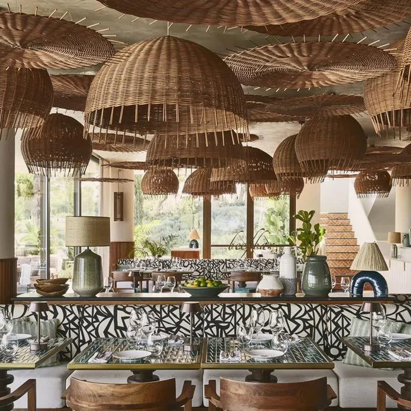 Frayed Rattan Dome Pendant Lights with Rattan Decorative Art over a restaurant