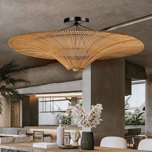 Junita Oversized Wide Rattan Pendant Light over Wabi Sabi Dining Table