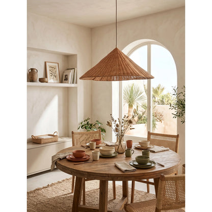 Kalani Rattan Scallop Pendant over Boho Dining Table