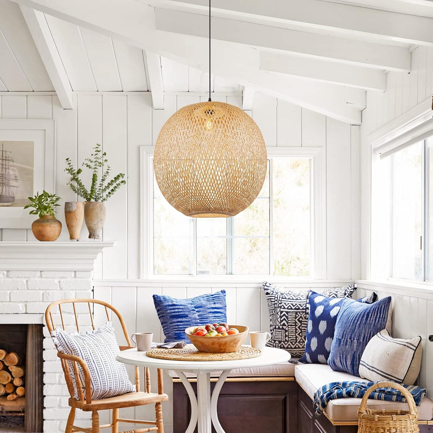 Lucy round bamboo pendant light over dining table