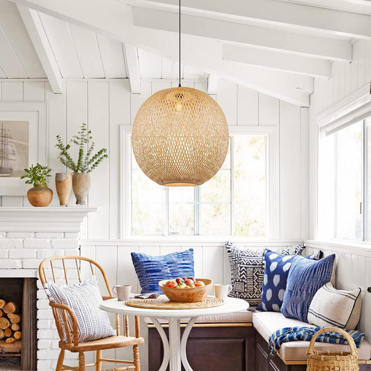 Lucy round bamboo pendant light over dining table