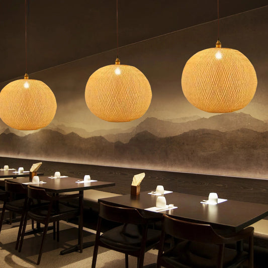 Lucy round bamboo pendant light over restaurant tables