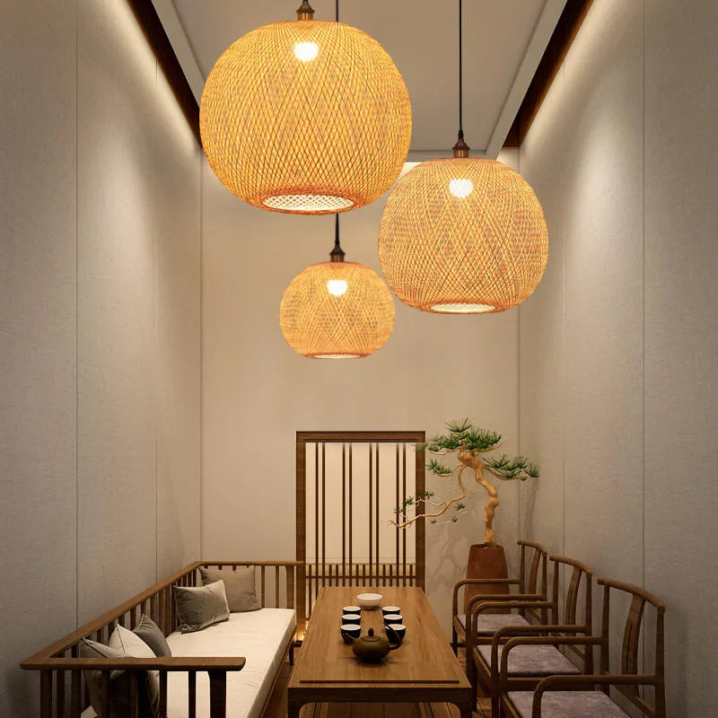 Lucy Round Bamboo Pendant Lights over Dining Room
