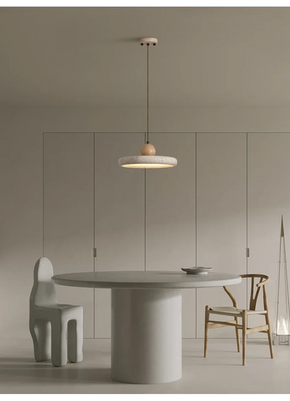 Mannelli Circular Travertine Stone Pendant Light in wabi sabi dining room