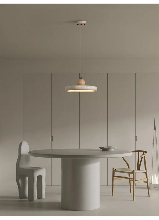 Mannelli Circular Travertine Stone Pendant Light in wabi sabi dining room