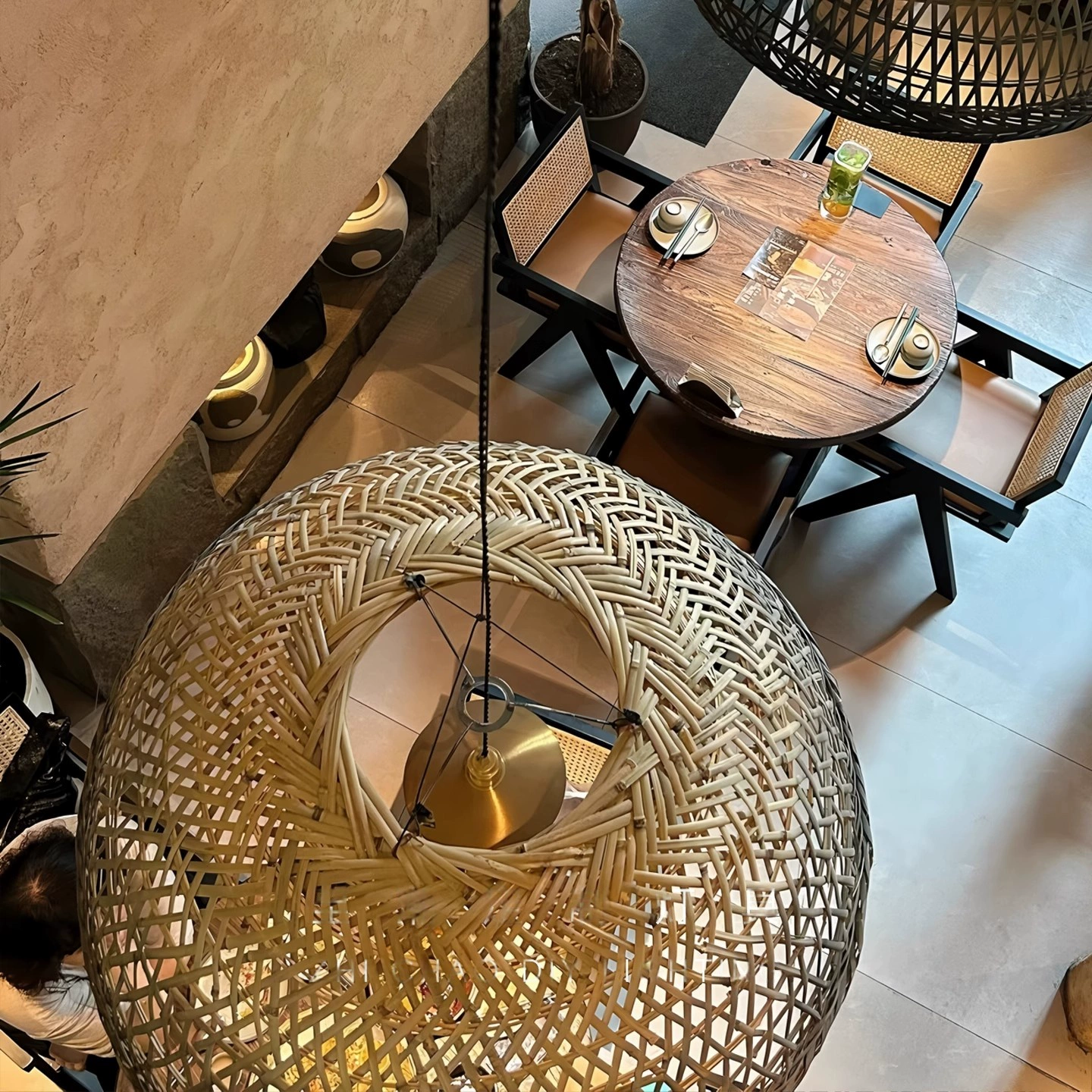 Neroweave Extra Large Black Dome Rattan Pendant Lights over Cafe