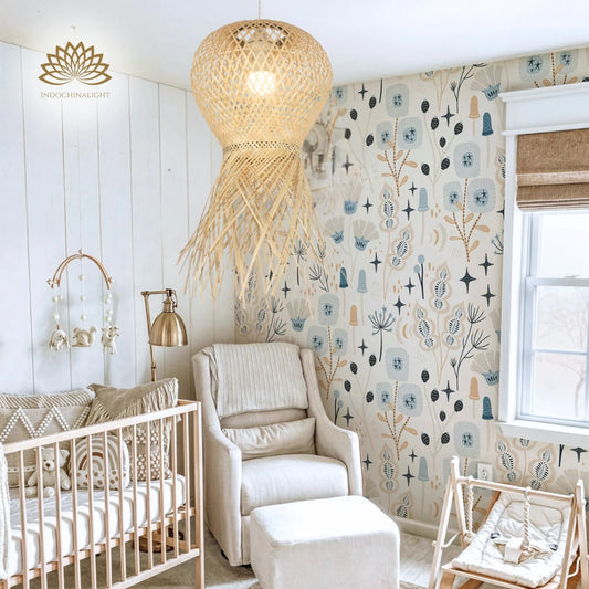 One unique Geragur Tassel handwoven bamboo pendant light hangs in a cozy Scandinavian nursery featuring patterned wallpaper