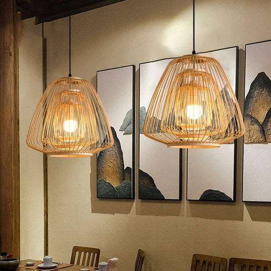 Plura Abstract Bamboo Pendant Light shade over restaurant table