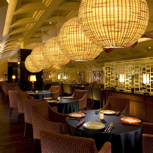 Santa Barbara Round Bamboo Pendant Lights over Restaurant Tables